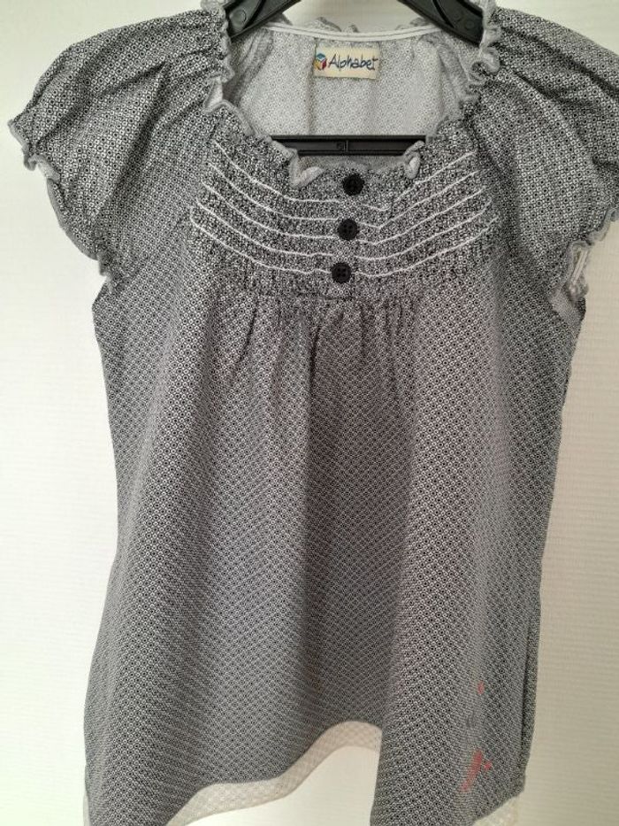 Blouse noire et blanche
