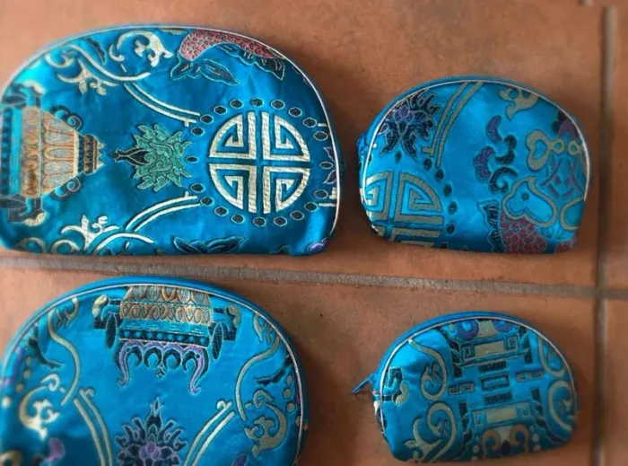 4  pochettes de Chine neuves