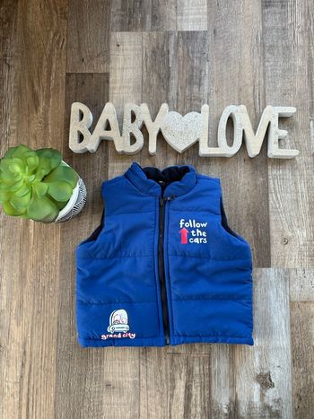 - Doudoune  - 6 mois - Très bon état