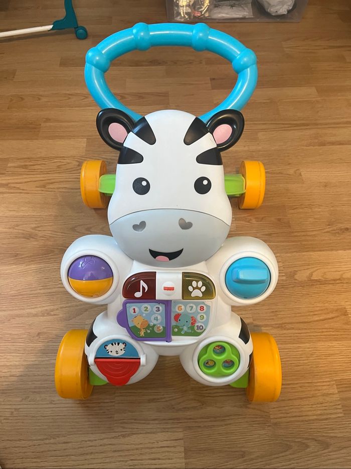 Trotteur pousseur bébé