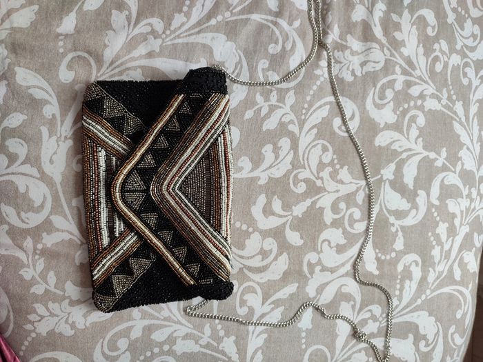 Pochette noire à ornements dorés et argentés - photo numéro 2