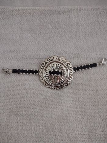 Bracelet argenté avec medaillon