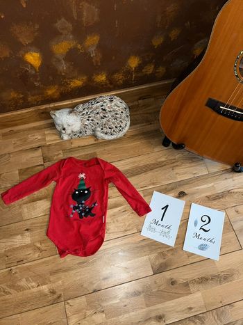 Joli body rouge de Noël très bon état hema 74-80cm