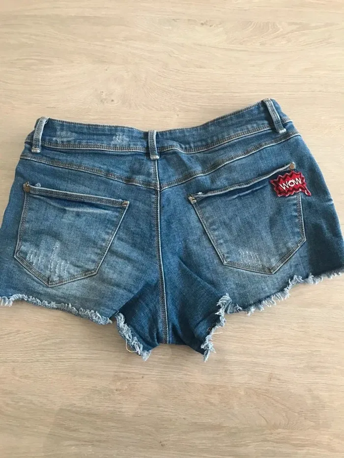 short court en jean motifs tropicaux - photo numéro 4
