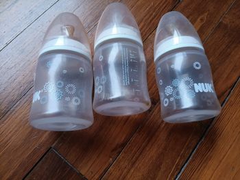 3 biberons  nuk