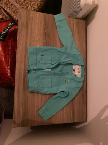Gilet à zip turquoise