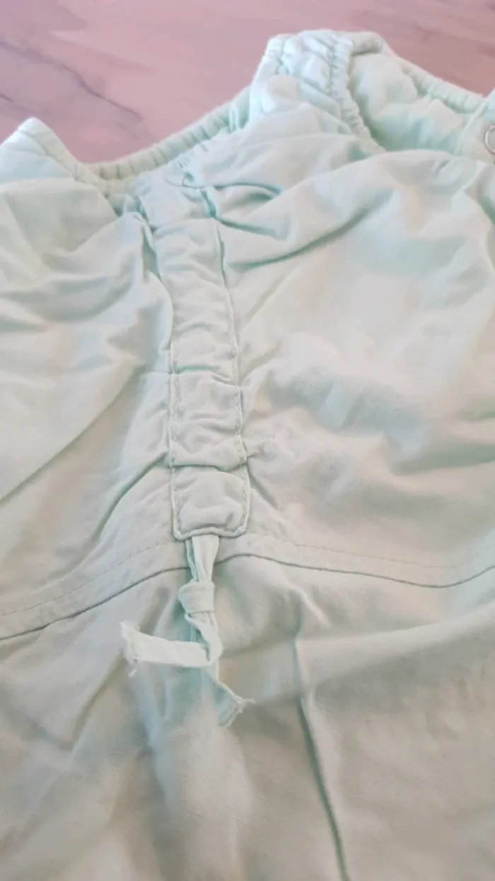 Tee-shirt sans manches vert d'eau - photo numéro 3