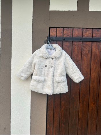 Manteau fausse fourrure
