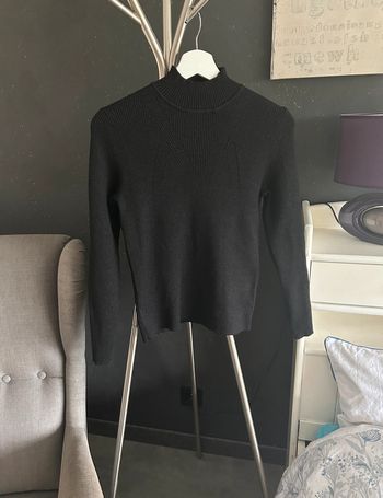 Pull col montant