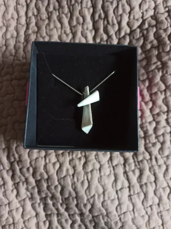 Collier as de plata