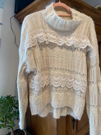 Pull col montant
