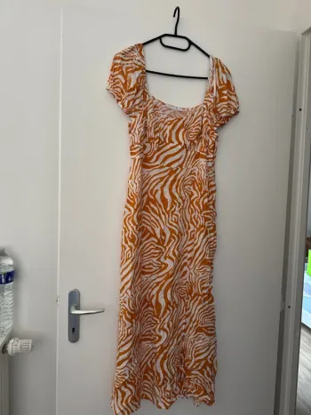 Robe longue orange et blanche Primark