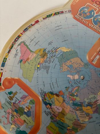 Planisphère terra in mano recto verso