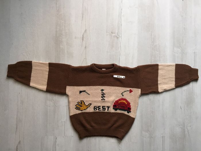 577-Pull marron 8 Ans