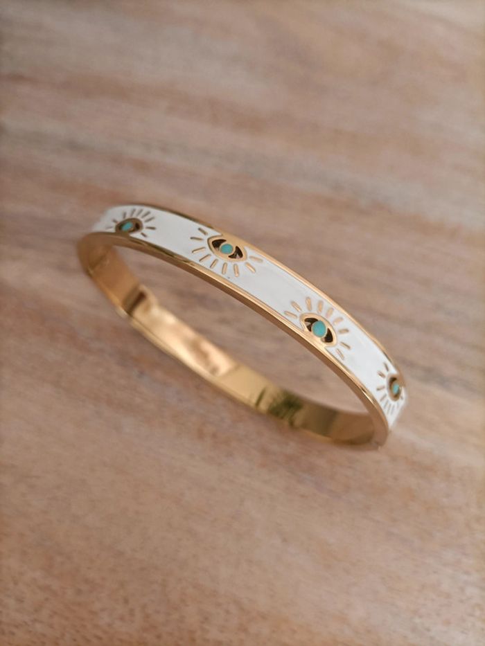 Ensemble de bijoux en acier doré'Oeil du Diable' - photo numéro 2