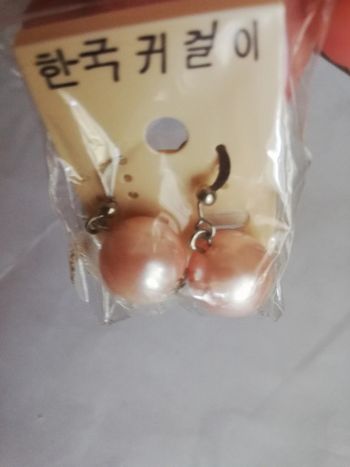 Très jolies b o neuves perles rose poudré