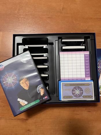 Jeu de société qui veut gagner des millions avec dvd neuf