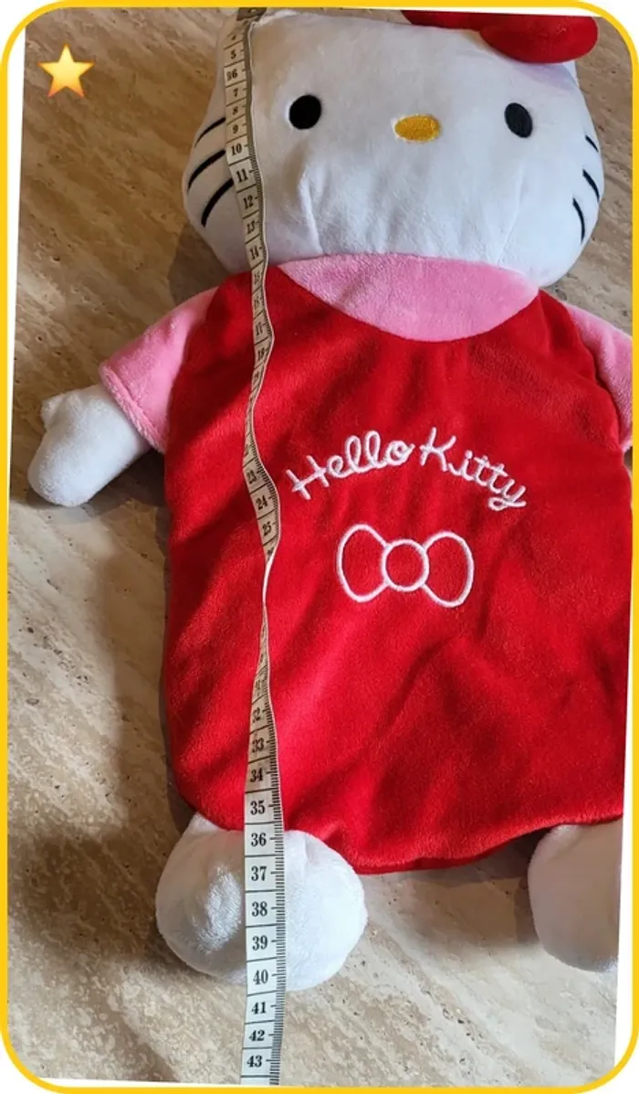 Peluche / Doudou Hello Kitty Sanrio rouge & rose avec poche - Neuf sans étiquette - photo numéro 10