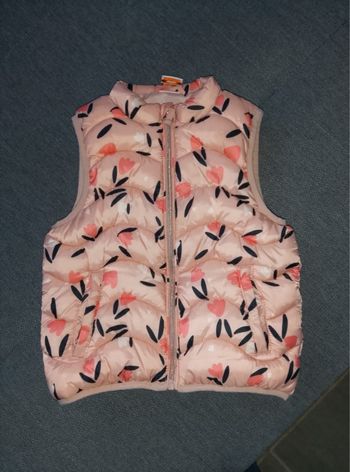 Doudoune sans manche tape à l’oeil 