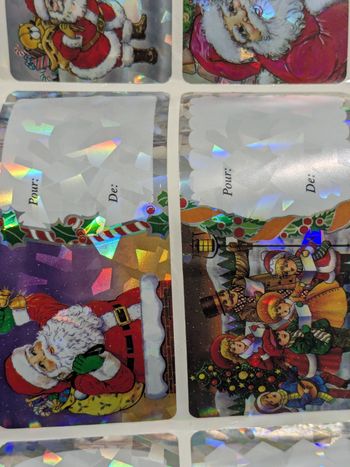 Lot de 12 étiquettes brillantes pour vos cadeaux de Noël.