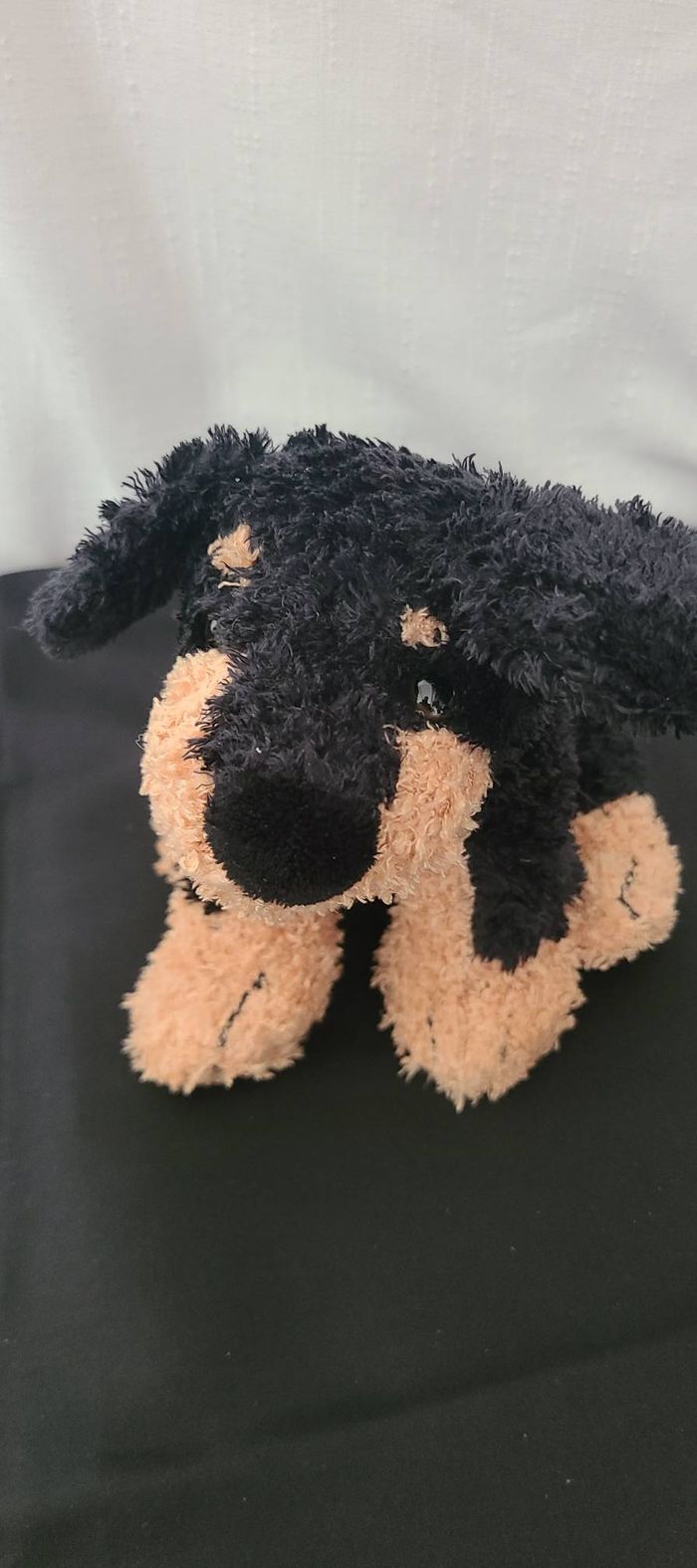 Peluche Chien noir et marron