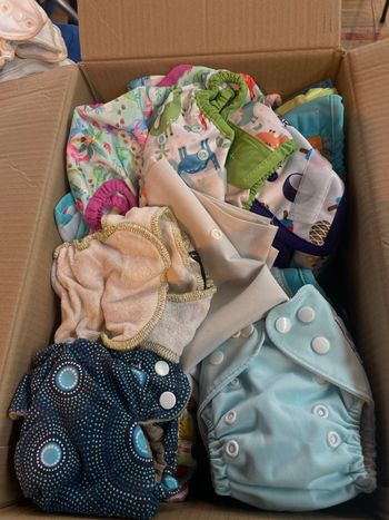 Lot surcouches et couches naissance