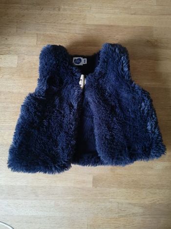 Veste sans manches en fausse fourrure