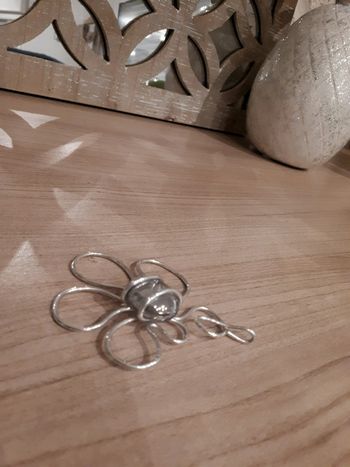 Pendentif fleur argenté