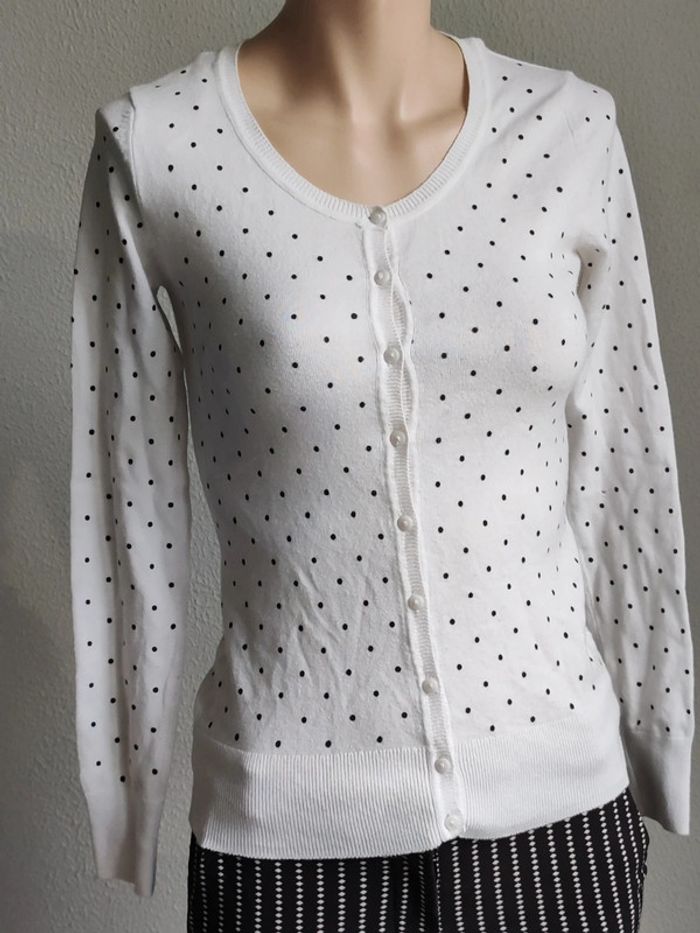 Gilet à pois blanc et noir