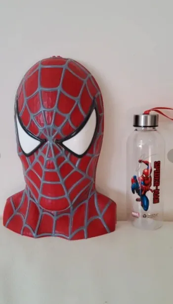 Lot Lego  tête Spiderman et gourde neuve