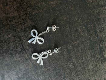 Paire de boucle d’oreilles noeuds