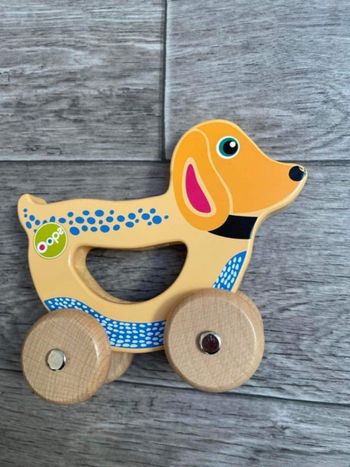 Chien en bois à roulettes Oops