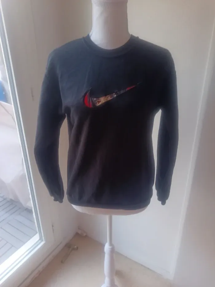 Un sweat taille XS
