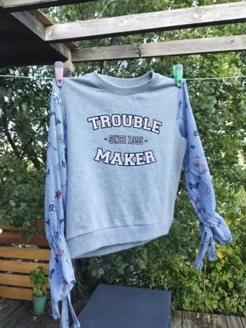 Pull sweat manches fantaisie Jennyfer XS