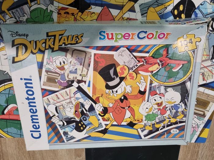 Puzzle complet 104 pièces duck tales avec boite abimée - photo numéro 4