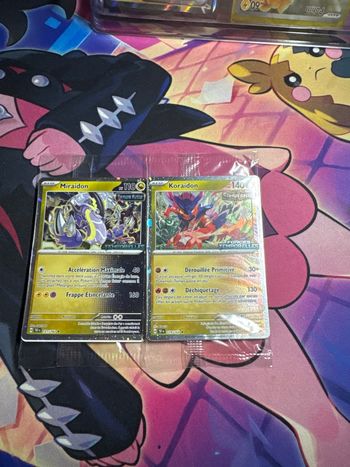 Carte Pokémon koraidon et miraidon stamp