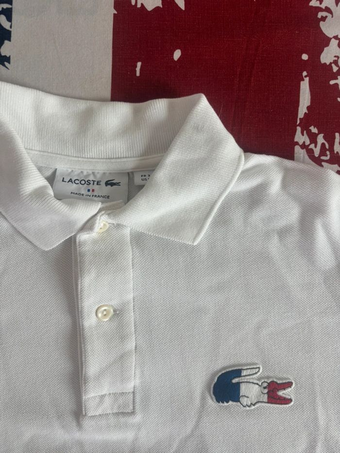 Polo manches longues Lacoste, taille S. Crocodile, bleu, blanc rouge - photo numéro 2
