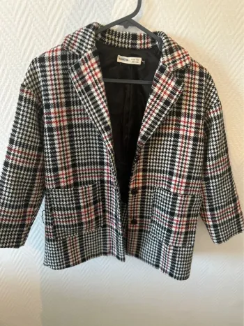 Manteau à carreaux