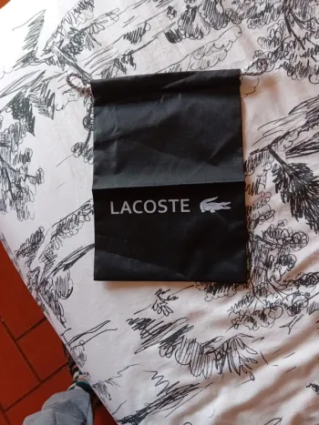 Pochette lacoste unisexe
