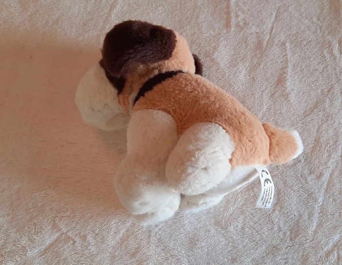 Jolie petit chien en peluche - photo numéro 4