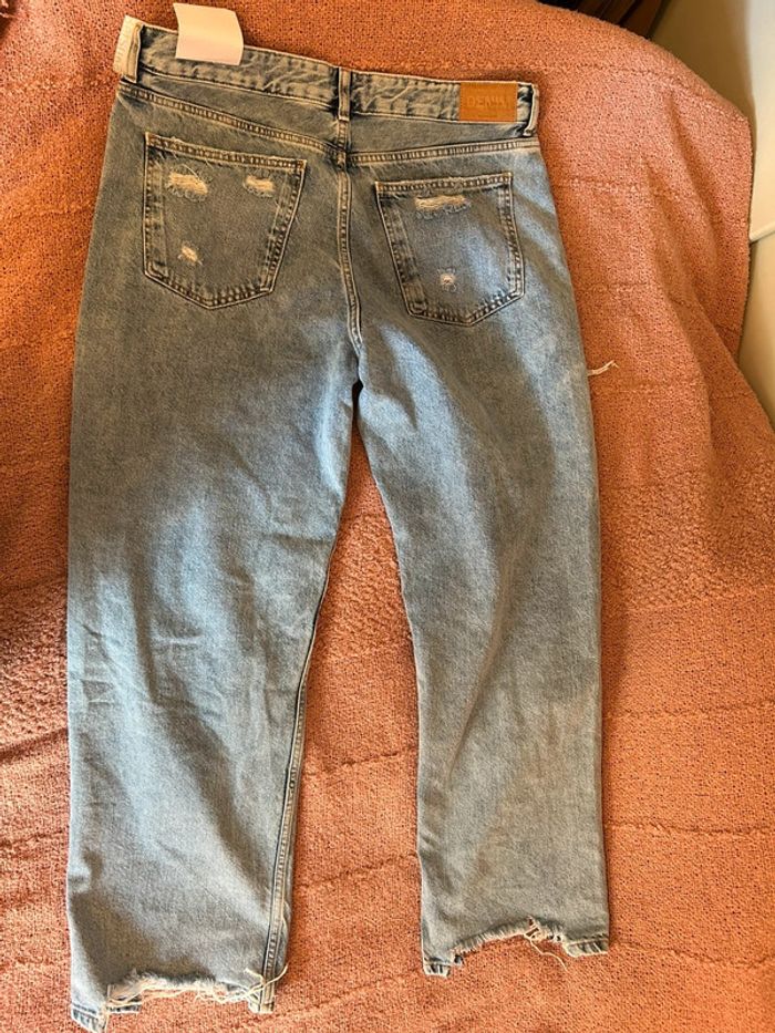 Jeans bleu clair effet déchiré • taille 42 - photo numéro 13