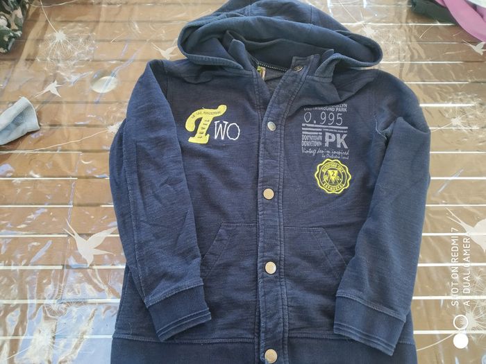 Gilet a boutons pressions