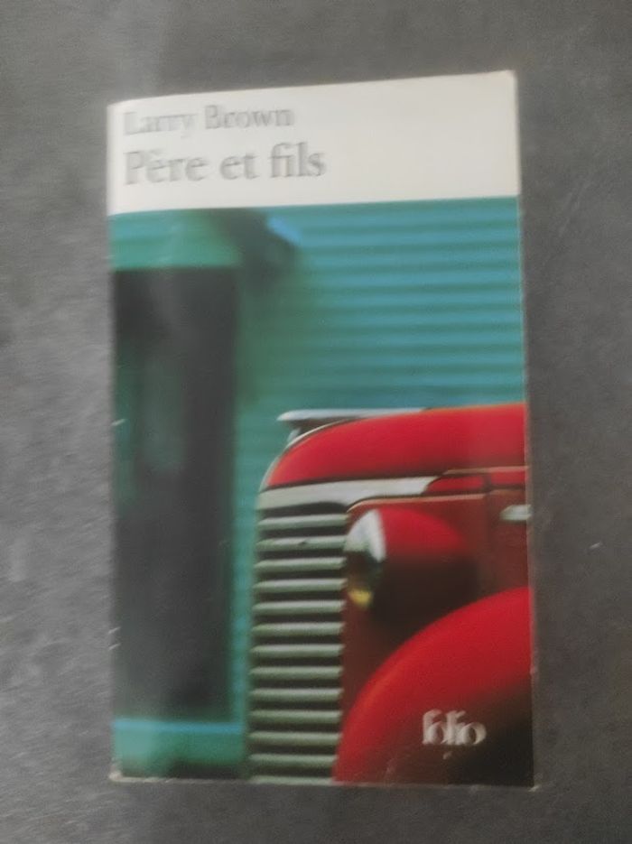 Père et fils Larry Brown Folio 2002