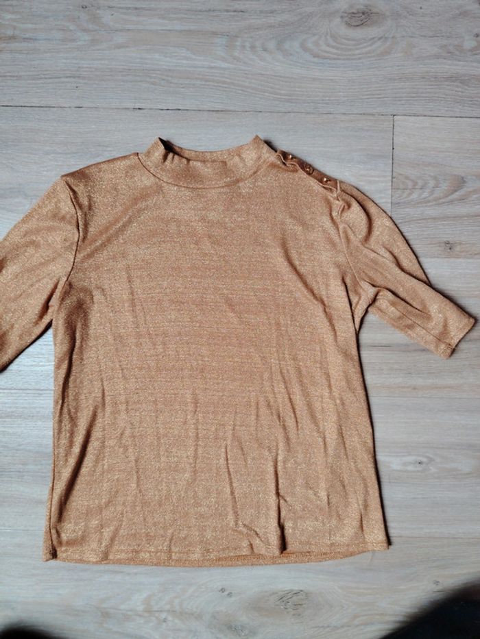 Haut léger dore pailleté