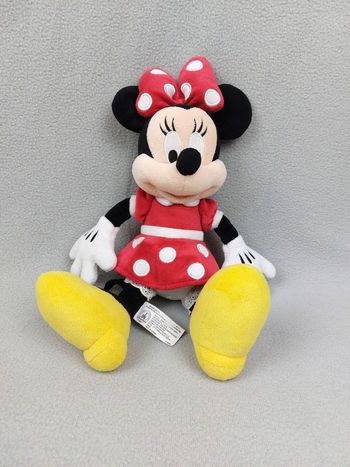 Peluche doudou Minnie 33 cm Disney parks DISNEYLAND robe et noeud rouge à pois