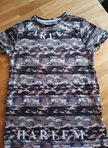 T-shirt en très bon état taille 11/12ans