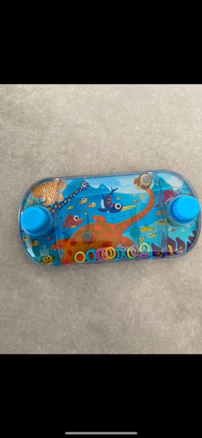 Jeu des anneaux dinosaure neuf