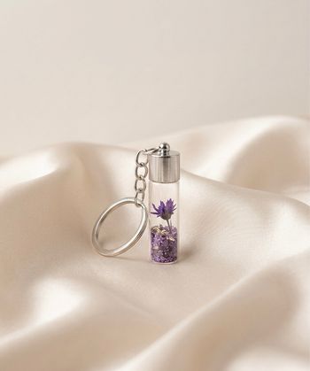 Petit porte clé fleur séché violet neuf