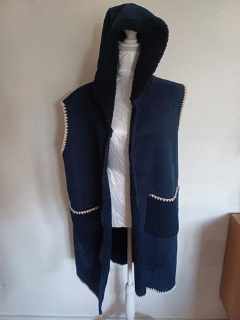 Veste longue sans manche