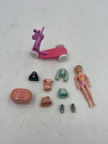 Figurine Polly Pocket + tenues et accessoires (x8) Mattel